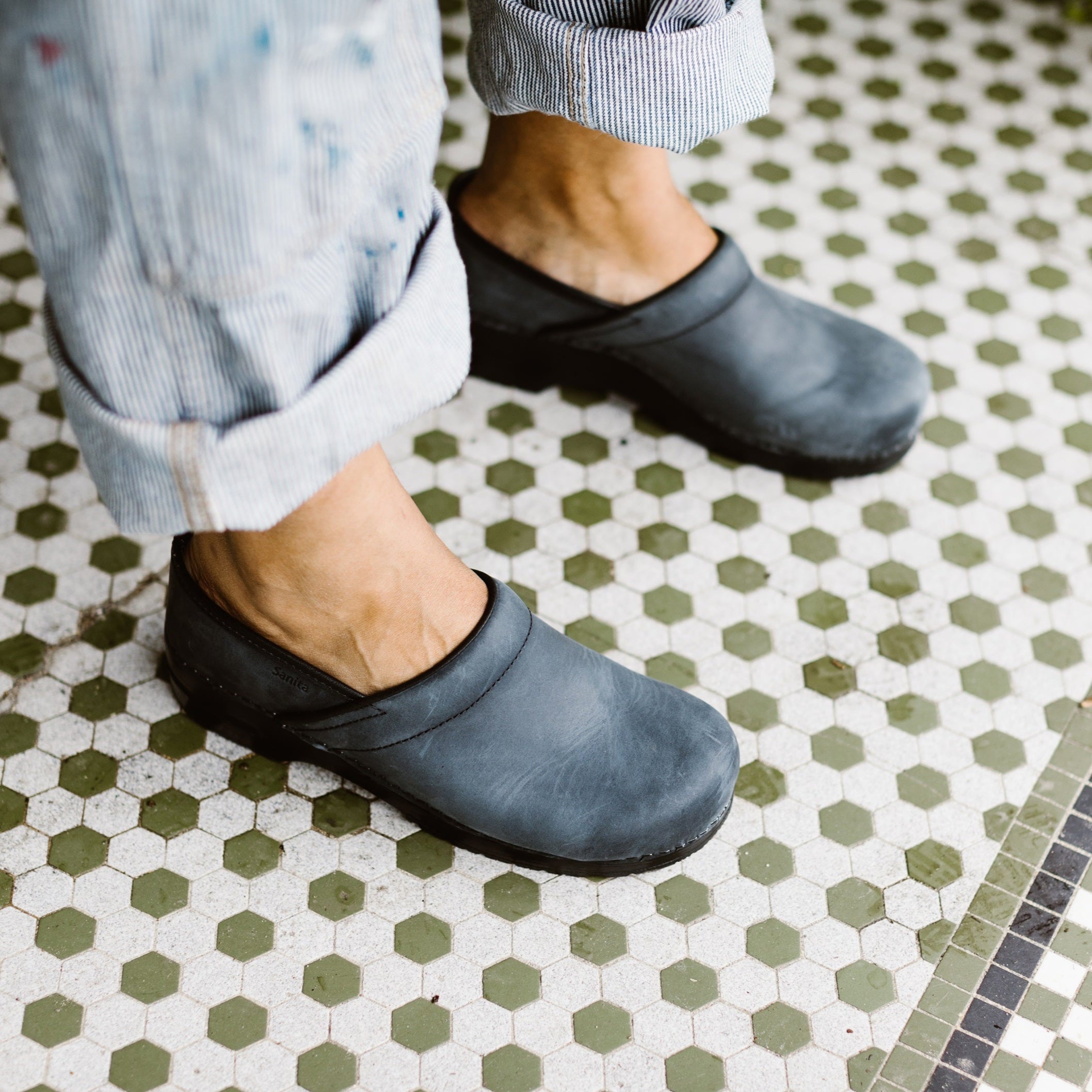 Dansko Clogs On Person Dansko Black Leather Clog Slip On Ankle