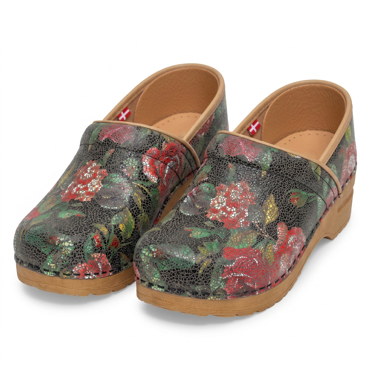 Pair of floral-patterned clogs on a white background